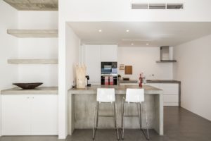 modern-kitchen-with-gray-tile-floor-and-white-P987QD9-1-scaled.jpg